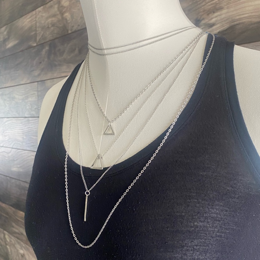 Silver 5 tier necklace. All one piece, top fits like a choker.